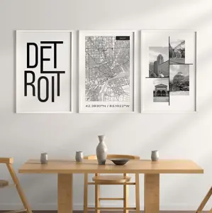 City and state wall art prints featuring Detroit skyline and urban-inspired designs in a modern dining area