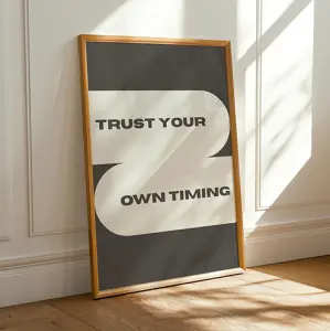 Text and motivation wall art print with the quote “Trust Your Own Timing” in a minimalist frame